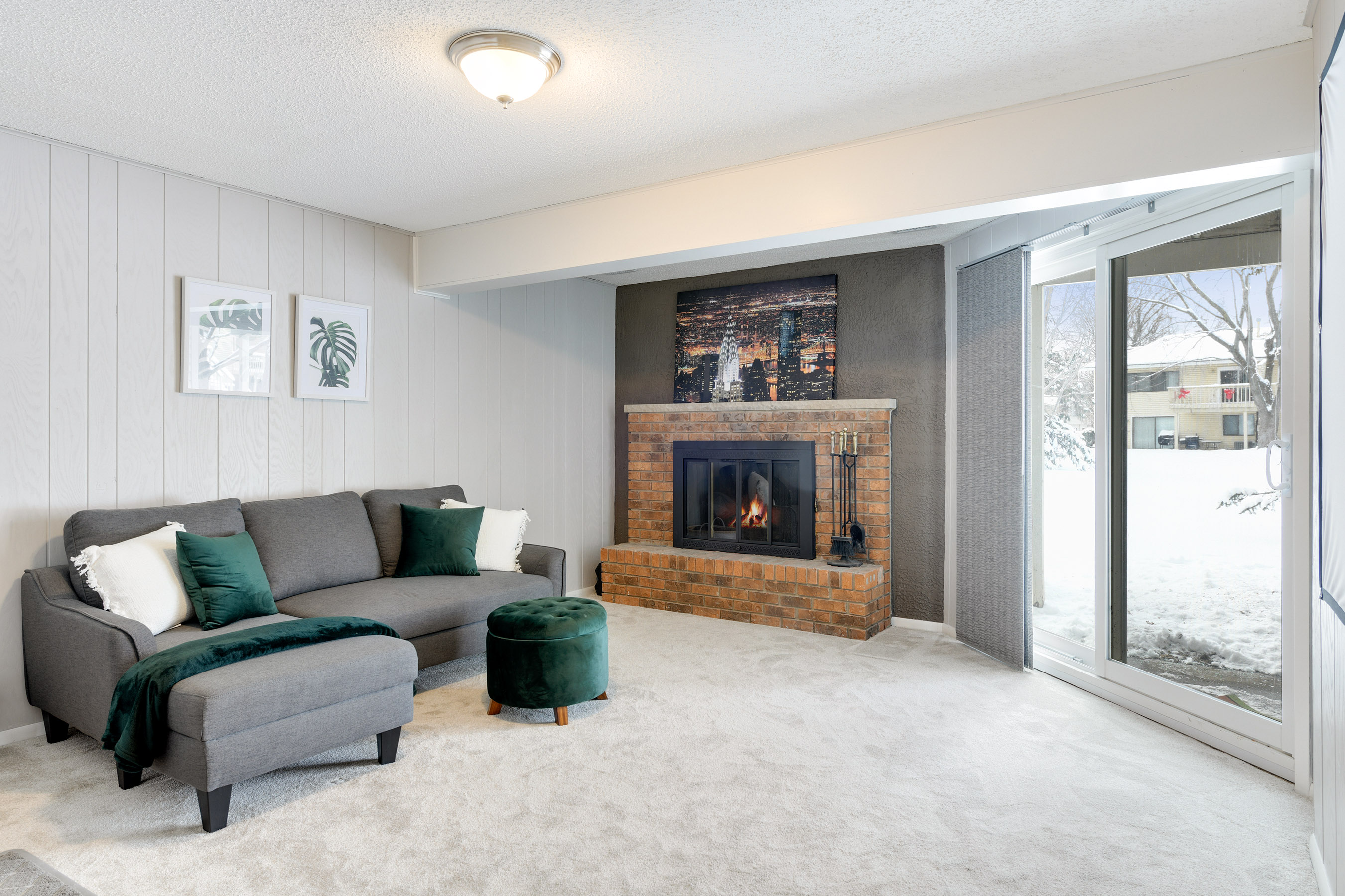 Family Room with working Wood Burning Fireplace and Walkout to Patio!