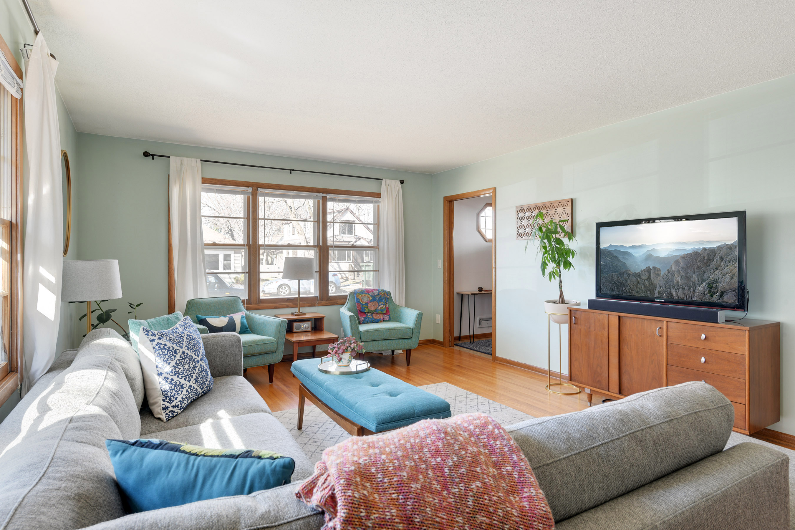 Hardwood floors accentuate the mid-century feel throughout the main level