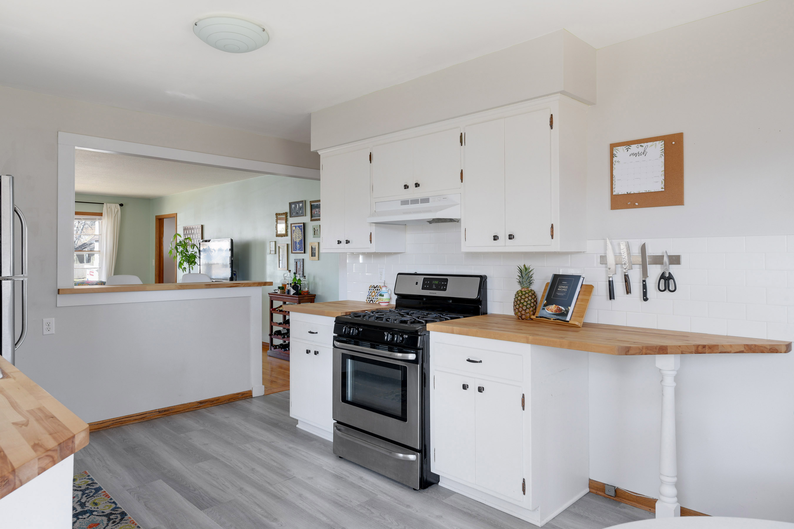 Updates throughout Kitchen including newer flooring, counters, and appliances.