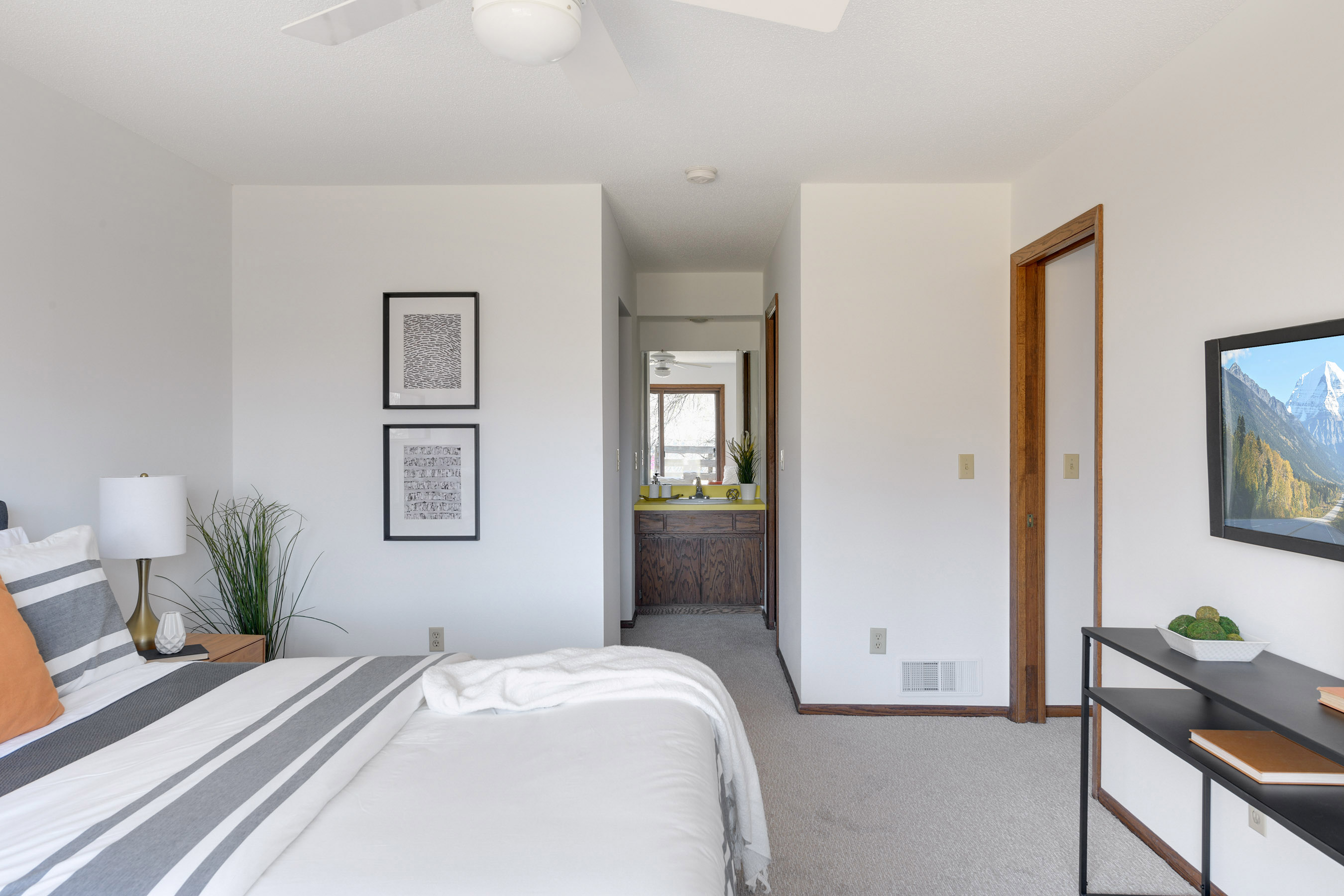 Owner's bedroom includes walk-in closet, private bathroom with shower, and walkout to deck!