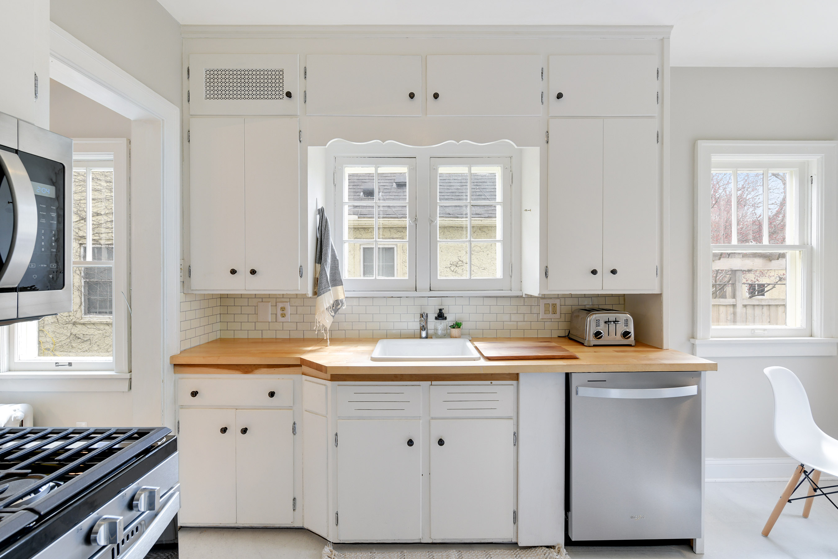 New Countertops and Refinished Cabinetry