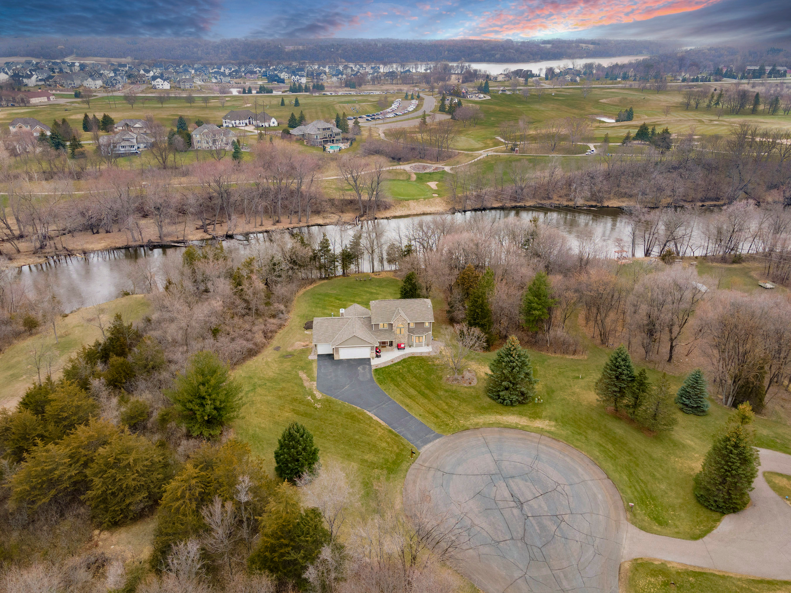 Breathtaking view of the property. It is beautiful the way the Crow River bends for 312 feet around this estate.