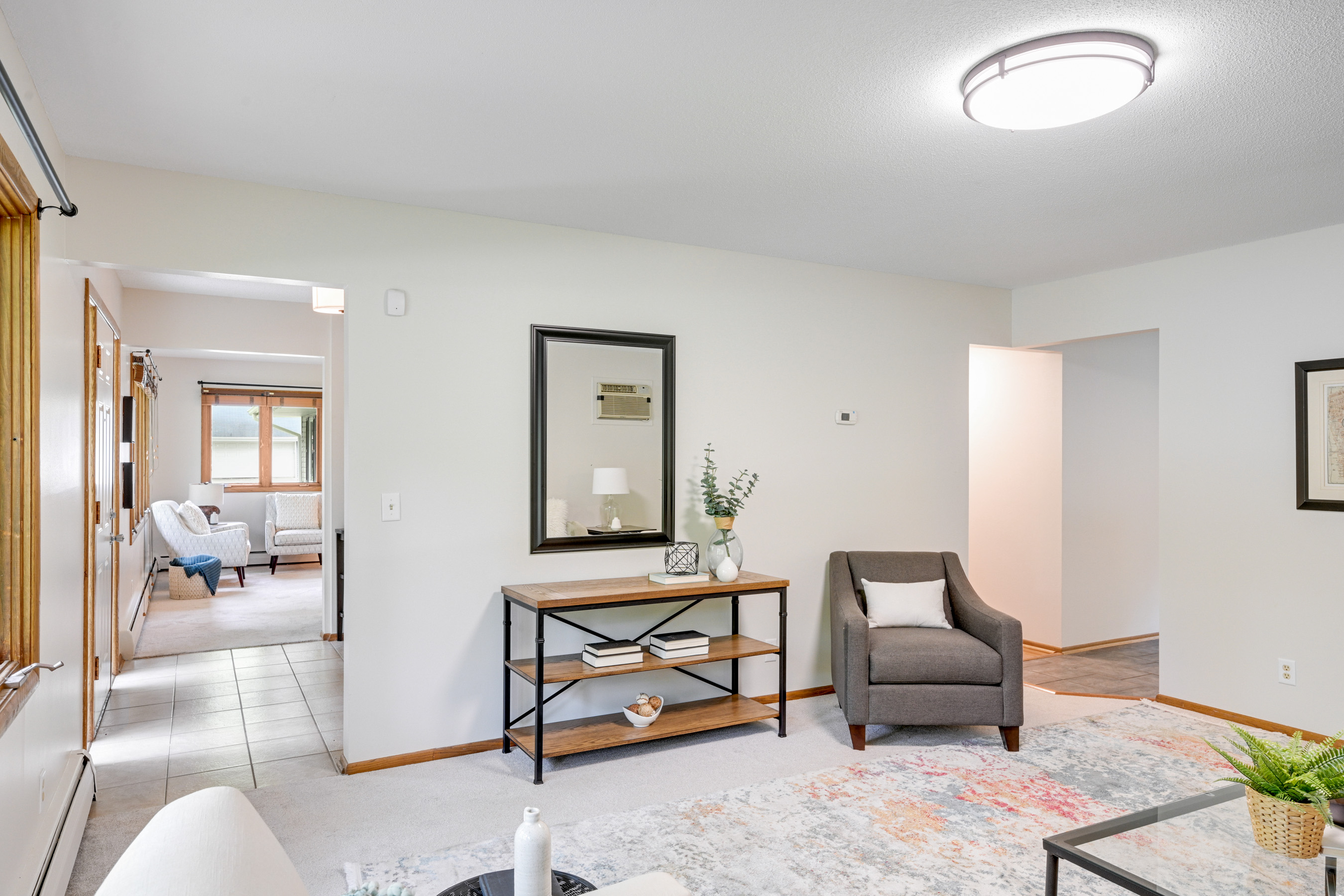Living opens to Foyer and Dining Room