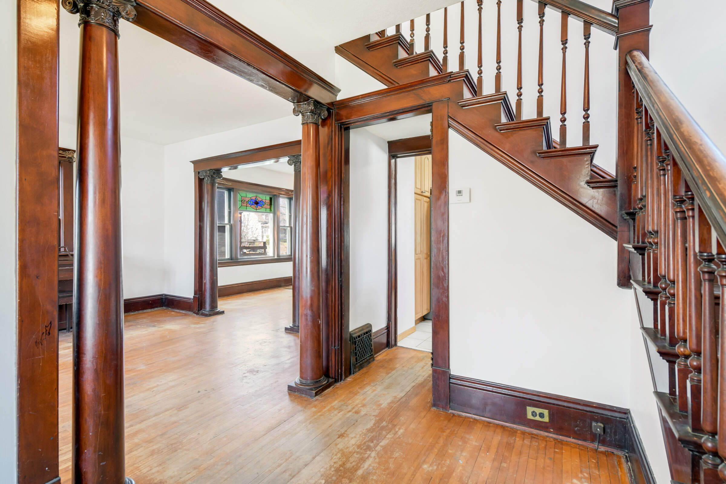 Beautiful, intricate woodwork and classic details, including this gorgeous open staircase