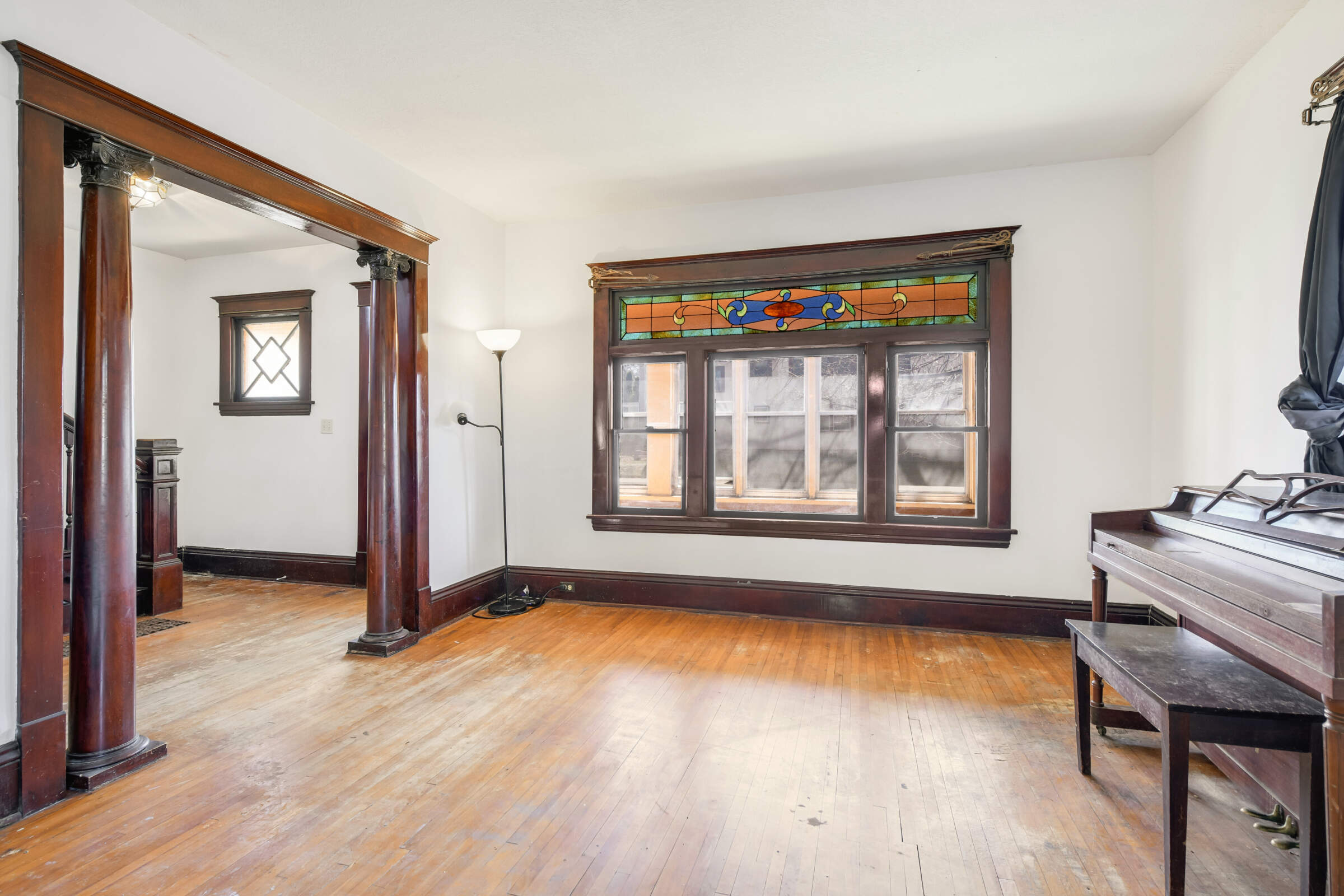 Stunning stained glass window and original woodwork and details