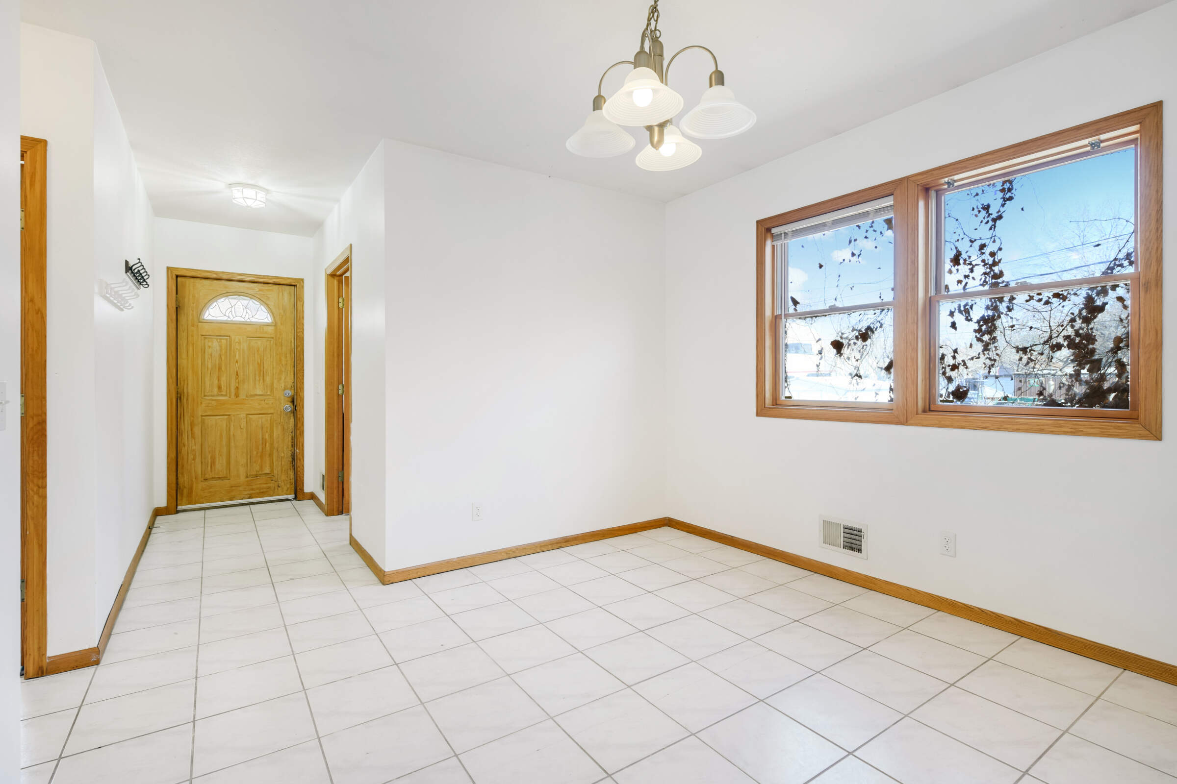 View of the back entry with convenient access to the main level laundry room