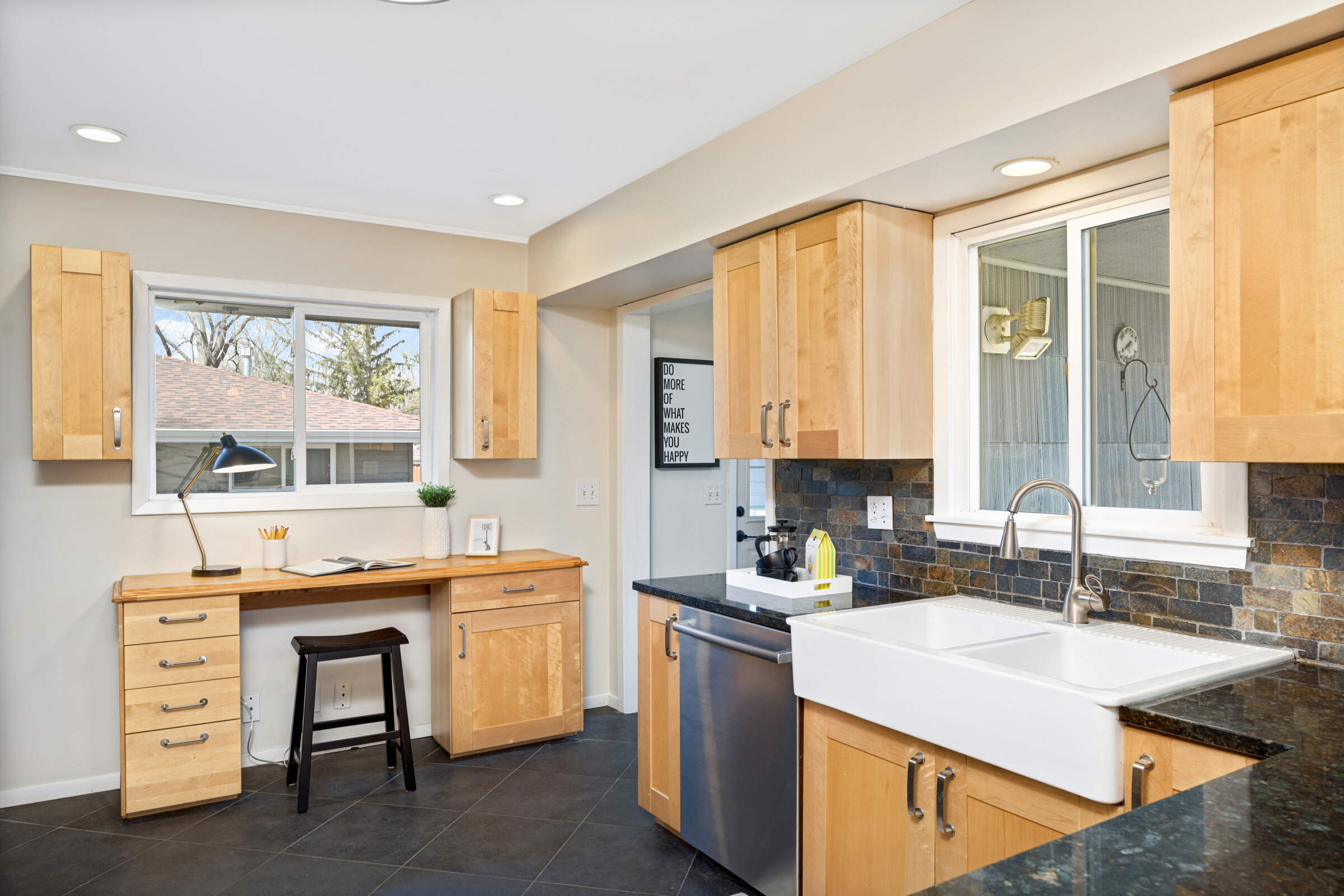 Opened kitchen with lots of cabinet and counter space