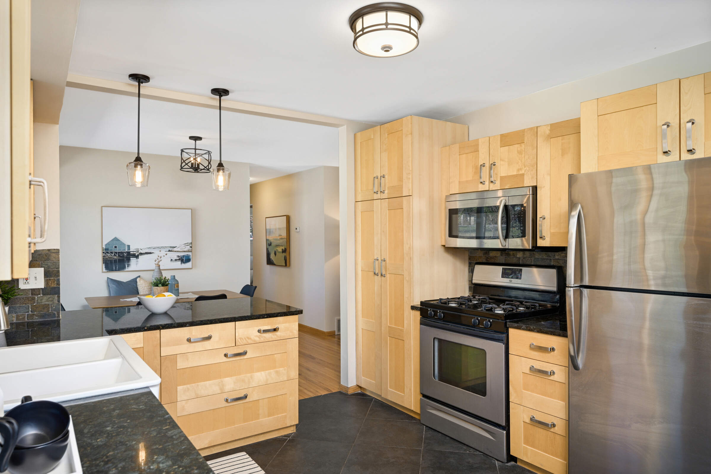 Stainless Steel Appliances, Tiled Floor, and deep Double Sink